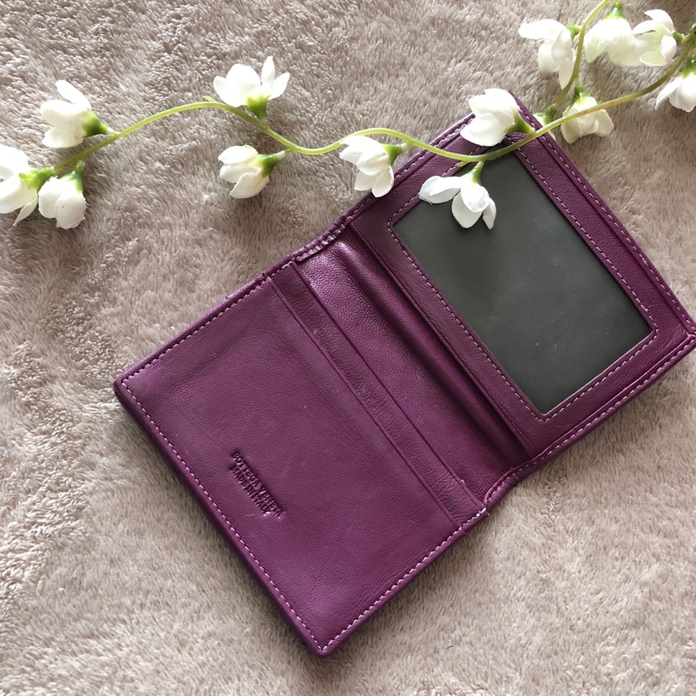 Purple Bottega Veneta wallet.